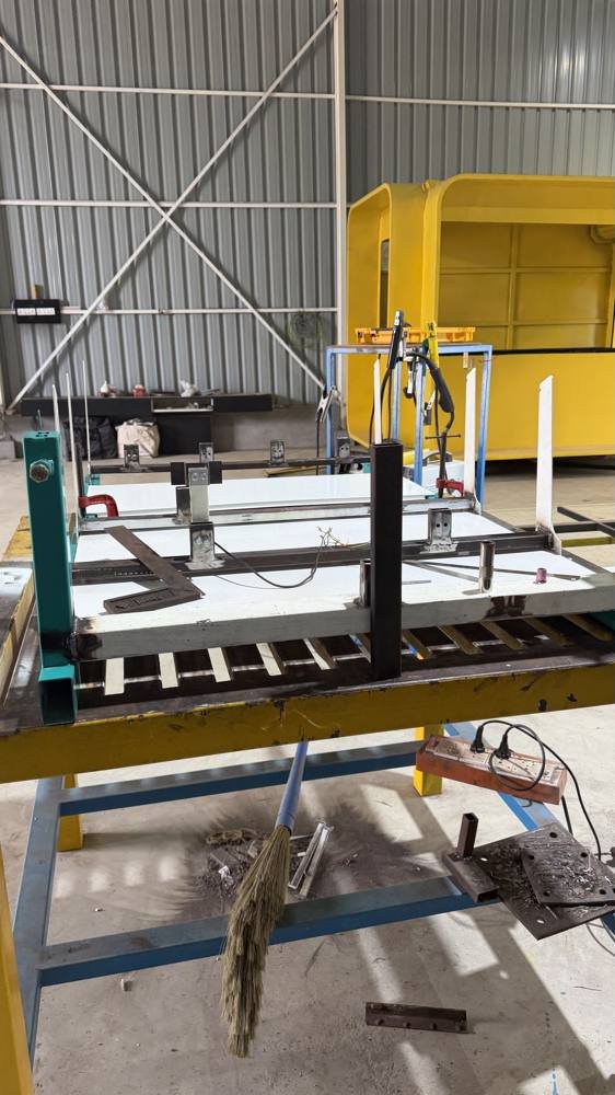 A build held square on the shop floor jig.